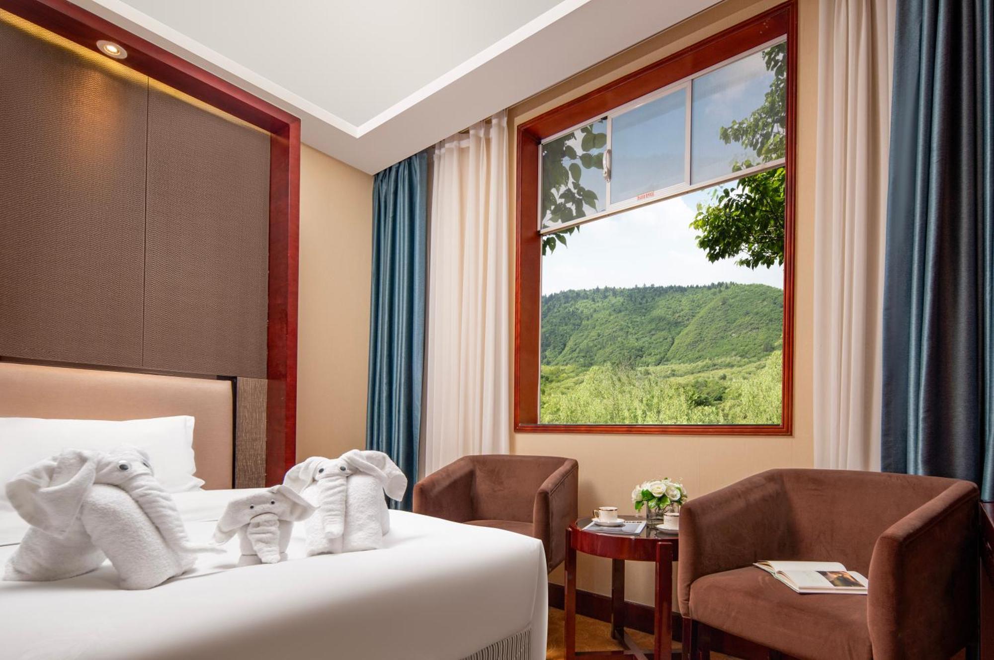 New Jiuzhai Hotel Дзиуджайгоу Екстериор снимка